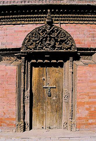 
Door with carved portal.
